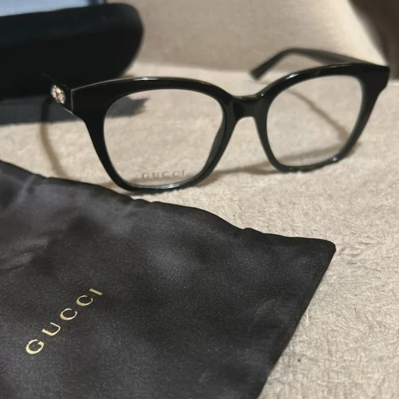 New gucci glasses. Never worn. Authentic. Can provide receipt. Cloth & case. - Picture 4 of 14